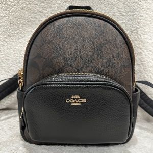 Coach Mini Court Backpack In Signature Canvas